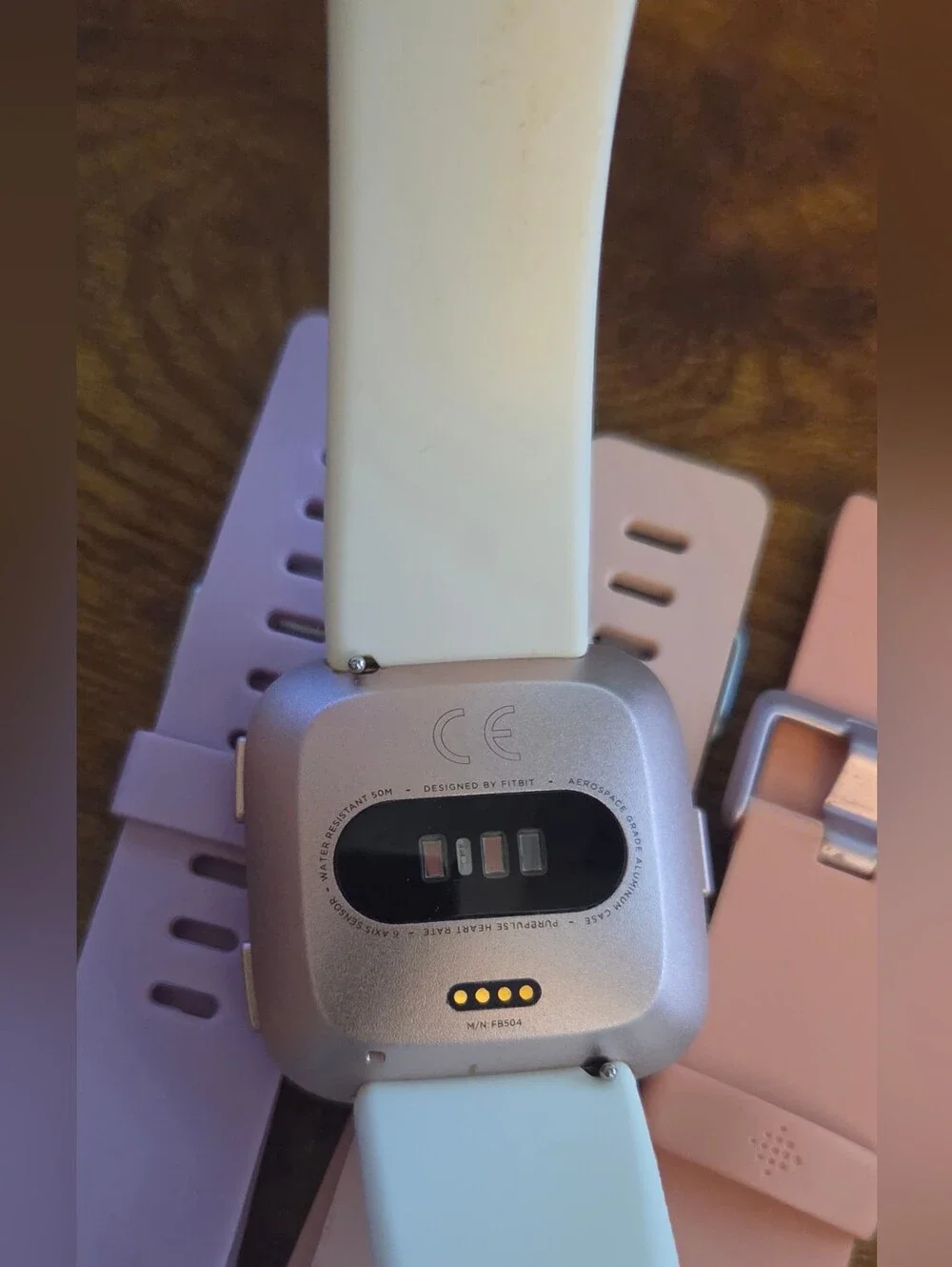 fitbit Versa Lite White Smartwatch with Pink, Peach, Lavender Bands & Charger